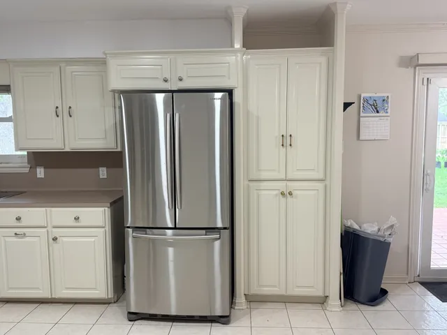 Before: the refrigerator wall and pantry