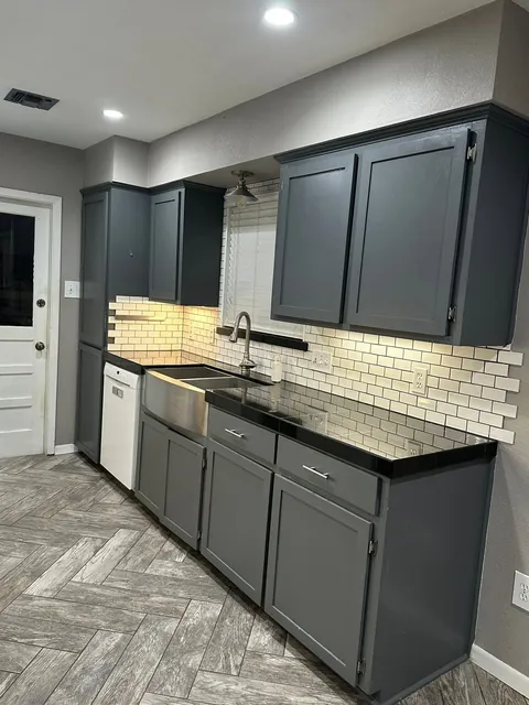 Before: slate cabinets and subway tile