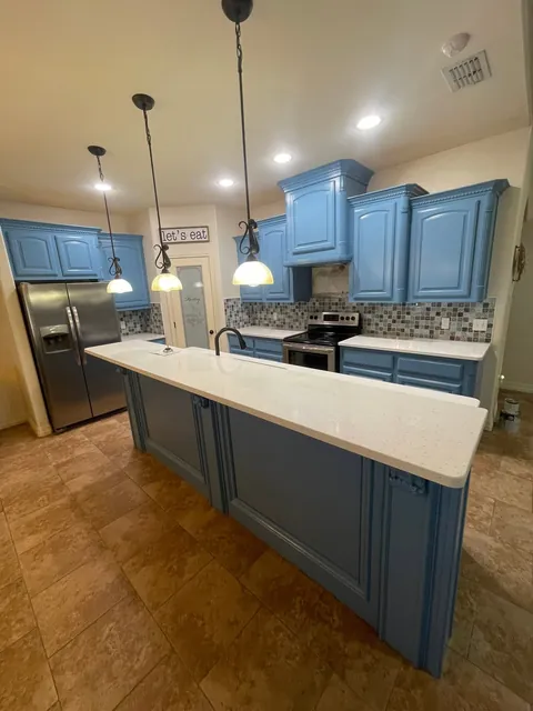 Blue island under pendant lights