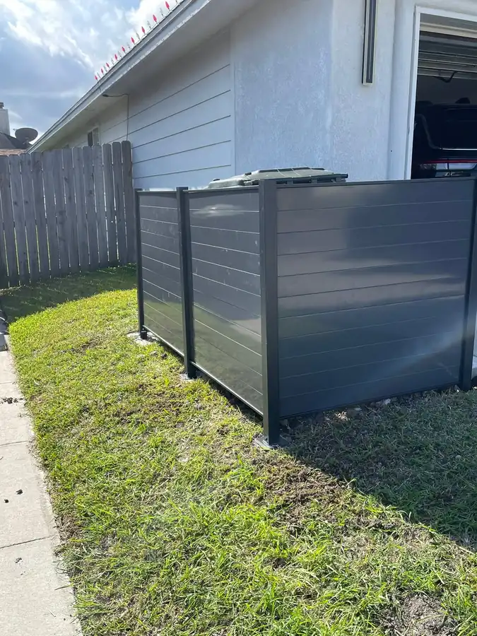 Metal trash-can enclosure on the new slab