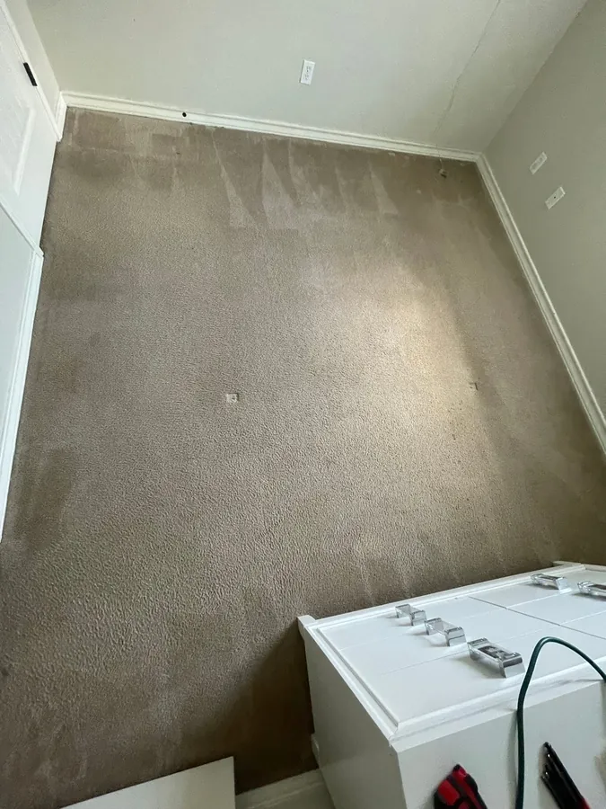 New wood-look vinyl plank floor in a bedroom
